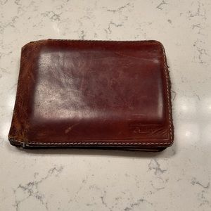 Very used Tumi Bifold wallet